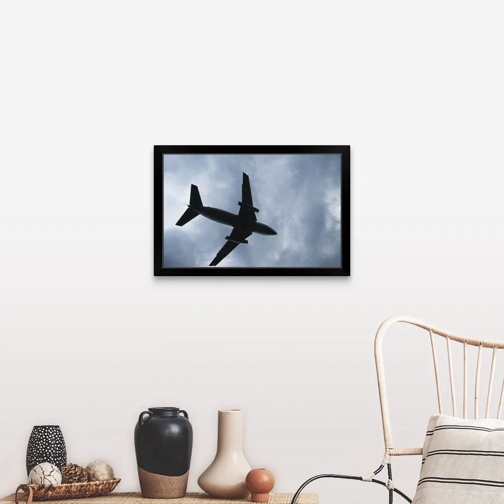 "Airplane in air, low angle view" Black Framed Print