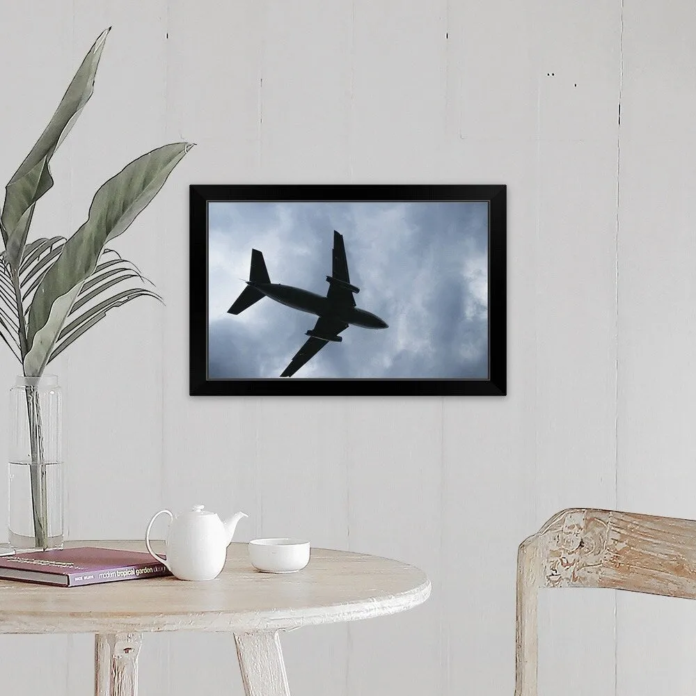 "Airplane in air, low angle view" Black Framed Print